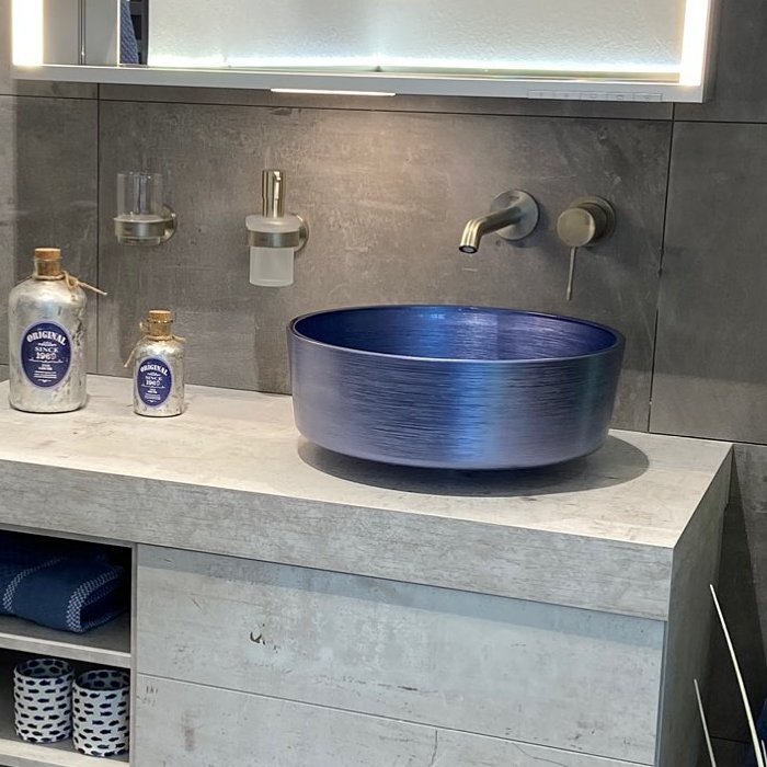 Modern blue table top wash basin round Metropole Katino Blue Glass Design