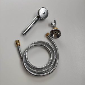 Shower head, flexible hose and wall mounted holder by NT022 Nettuno Paffoni